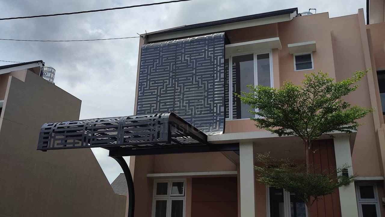 Kanopi lengkung minimalis untuk teras rumah type 36 dengan atap spandek